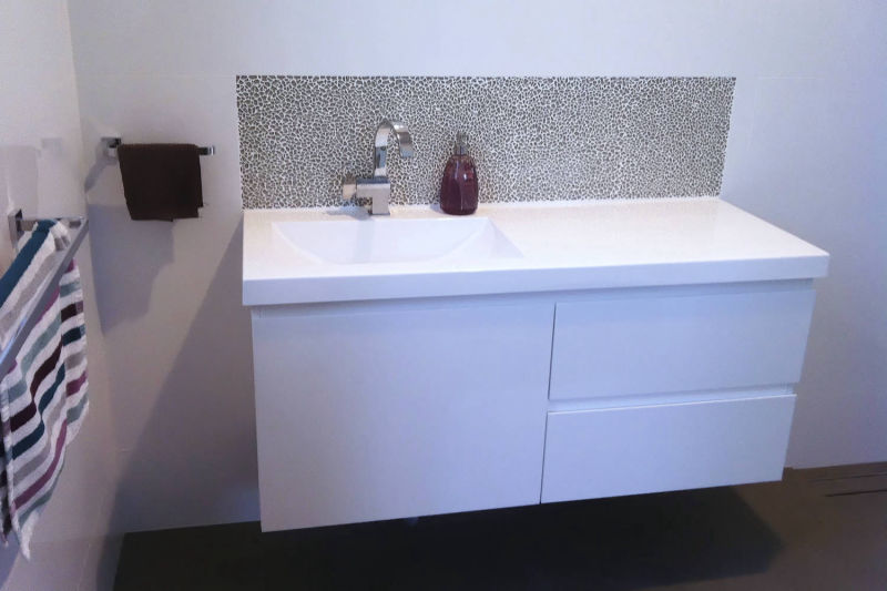 New bathroom cabinet and tiling