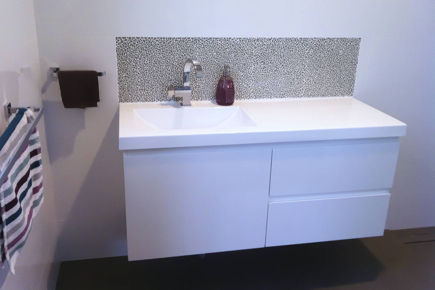 New bathroom cabinet and tiling