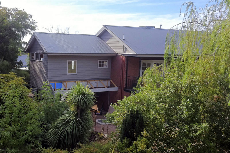 New garage with upper story extension