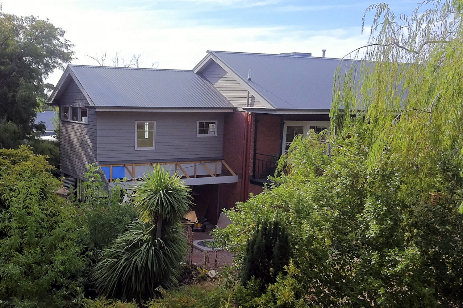 New garage with upper story extension